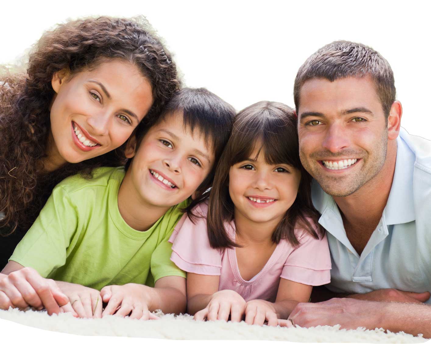 Smiling family of four lying on the floor together, showcasing a warm and supportive family environment.