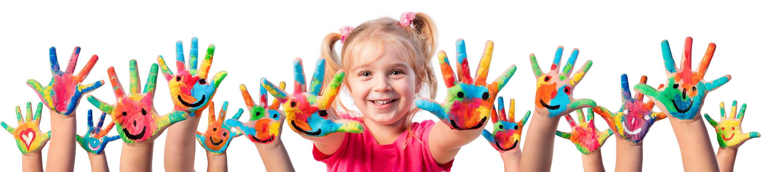 Smiling young girl surrounded by colorful painted hands with happy faces, representing creativity and joyful expression in children.
